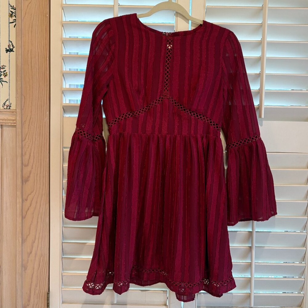 Red flowy dress with cutout detailing